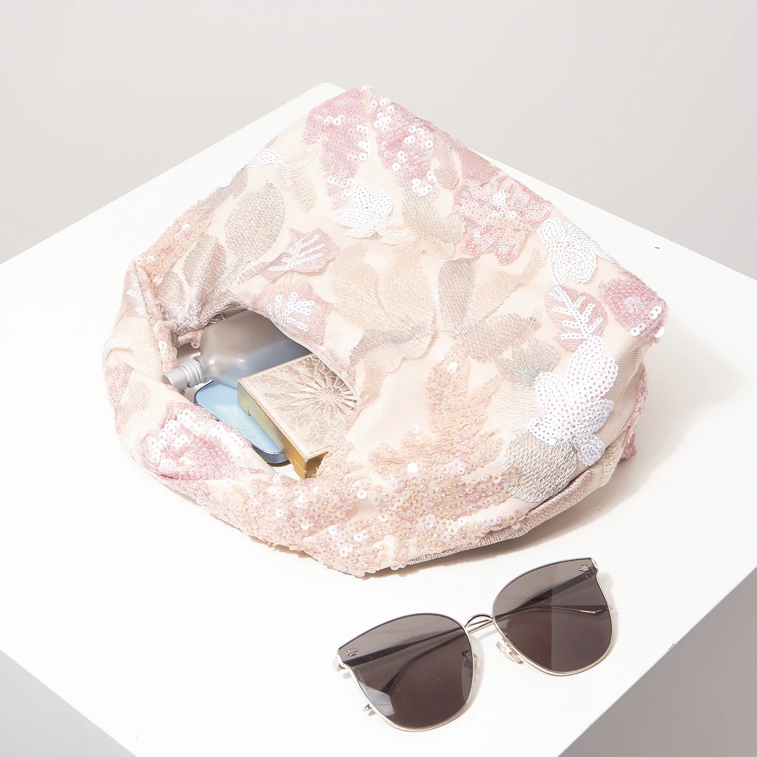 Rose & Mews blush floral sequin evening clutch interior capacity